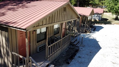 Modern Cabin with Gorgeous Wood Paneled Walls Nestled in the Scenic Beauty of the Ozarks - Mountain View, Arkansas - glamping.directory
