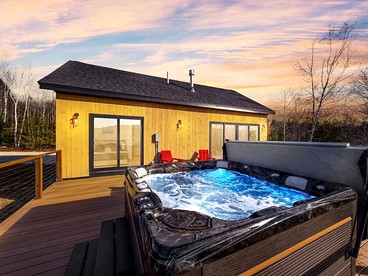 Peaceful New Cabin Retreat with Fireplace and Scenic Deck in Bridgton, Maine - glamping.directory