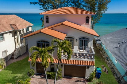 Luxury Waterfront Beach House with Stunning Views on Bean Point in Anna Maria, Florida - glamping.directory
