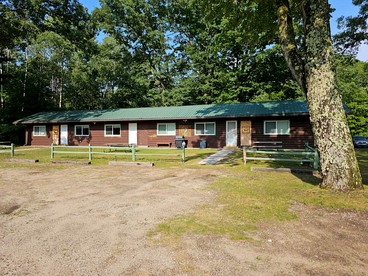 Beautiful Cottage Nestled Amidst Trees in Wellston, Michigan - glamping.directory