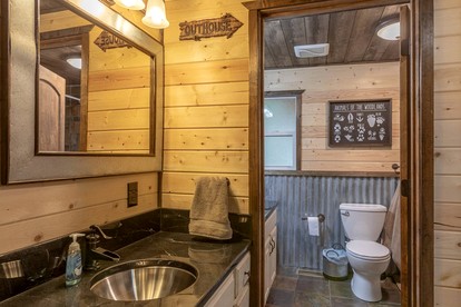 Spacious Rustic Cabin with Hot Tub and Game Loft Near Trails in Island Park, Idaho - Idaho City, Idaho - glamping.directory
