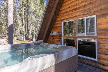 Spacious Rustic Cabin with Hot Tub and Game Loft Near Trails in Island Park, Idaho - Idaho City, Idaho - glamping.directory
