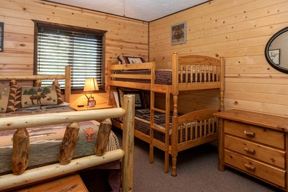 Spacious Rustic Cabin with Hot Tub and Game Loft Near Trails in Island Park, Idaho - Idaho City, Idaho - glamping.directory