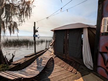 Waterfront Glamping Tent at Clothing Optional Glamping Resort on Lake George, Flordia - glamping.directory