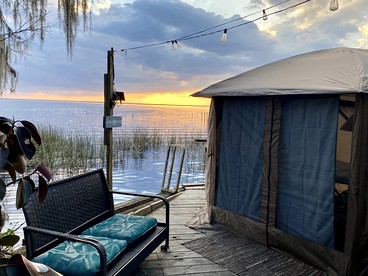 Waterfront Glamping Tent at Clothing Optional Glamping Resort on Lake George, Flordia - Seville, Florida - glamping.directory