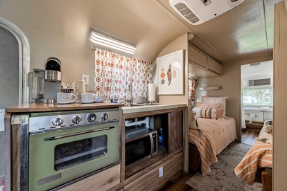 Newly Renovated Camper with Fresh Decor and Tiny Deck in Texas - Spicewood, Texas - glamping.directory