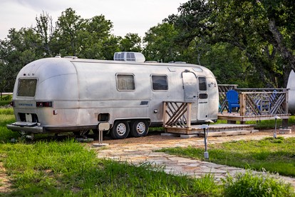 Newly Renovated Camper with Fresh Decor and Tiny Deck in Texas - glamping.directory