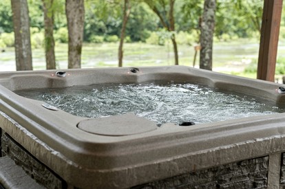 Waterfront Pet Friendly Cabin on Glover River with Hot Tub near Broken Bow, Oklahoma - Broken Bow, Oklahoma - glamping.directory