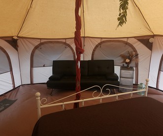 Rustic Bell Tent Rental with a Fire Pit for a Glamping Getaway in Nature near San Antonio, Texas - Pipe Creek, Texas - glamping.directory