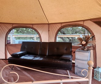 Rustic Bell Tent Rental with a Fire Pit for a Glamping Getaway in Nature near San Antonio, Texas - Pipe Creek, Texas - glamping.directory