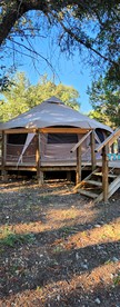 Rustic Bell Tent Rental with a Fire Pit for a Glamping Getaway in Nature near San Antonio, Texas - Pipe Creek, Texas - glamping.directory