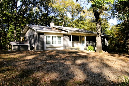 Peaceful Hideaway Cabin with Sunroom and Fire Pit near Lake Ouachita, Arkansas - glamping.directory