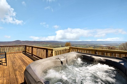 Picturesque Chalet-Style Cabin with Hot Tub, Minutes From the Shenandoah in Hardy County, West Virginia - Hardy County, West Virginia - glamping.directory