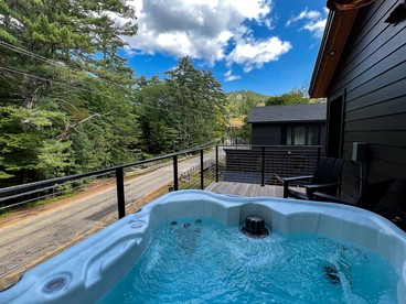 Modern Alpine Retreat with Private Hot Tub and Fireplace in North Conway, New Hampshire - North Conway, New Hampshire - glamping.directory