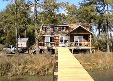 Two-Bedroom Log Cabin on the Shores of the Chesapeake Bay in Virginia - glamping.directory