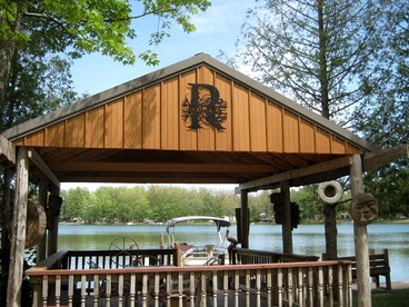 Blissful Lakeside Vacation Home with Pavilion and Dock near Woodland Park in Bitely, Michigan - Bitely, Michigan - glamping.directory