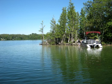 Blissful Lakeside Vacation Home with Pavilion and Dock near Woodland Park in Bitely, Michigan - Bitely, Michigan - glamping.directory