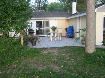 Blissful Lakeside Vacation Home with Pavilion and Dock near Woodland Park in Bitely, Michigan - glamping.directory
