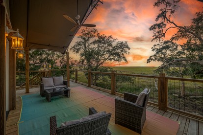 Secluded Treehouse Tent Retreat on the Marsh with Outdoor Dining, Grilling Gear, Games, Views in Townsend, Georgia - Townsend, Georgia - glamping.directory