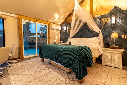 Secluded Treehouse Tent Retreat on the Marsh with Outdoor Dining, Grilling Gear, Games, Views in Townsend, Georgia - Townsend, Georgia - glamping.directory