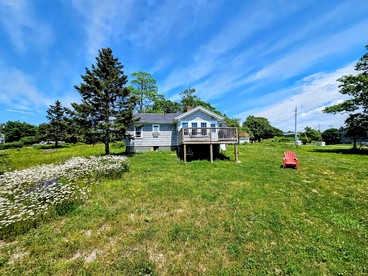 Picturesque Waterfront Cottage with Waterfall Views, Fireplace & Deck, Near Acadia National Park in Gouldsboro, Maine - Gouldsboro, Maine - glamping.directory