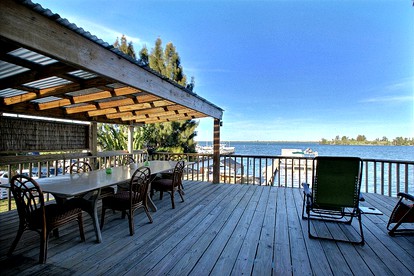 Beautifully Decorated Waterfront Chalet Rental in Grant, Florida - Grant, Florida - glamping.directory