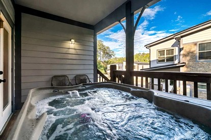Modern Cabin Retreat with Hot Tub & Game Loft in Pigeon Force, Tennessee - Pigeon Forge, Tennessee - glamping.directory