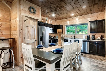 Modern Cabin Retreat with Hot Tub & Game Loft in Pigeon Force, Tennessee - Pigeon Forge, Tennessee - glamping.directory
