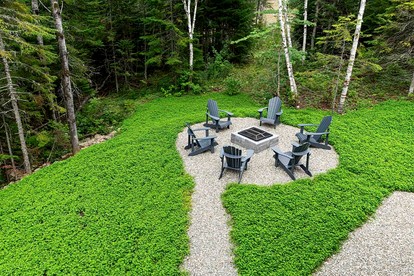 Incredible Modern Cottage with Fire Pit, Hot-tub and Foosball in Charlevoix, Michigan - Charlevoix, Michigan - glamping.directory