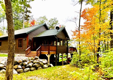 Cozy Lakefront Retreat with Game Room, Outdoor Living and Dock in Wisconsin - Stone Lake, Wisconsin - glamping.directory