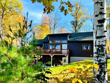 Cozy Lakefront Retreat with Game Room, Outdoor Living and Dock in Wisconsin - Stone Lake, Wisconsin - glamping.directory