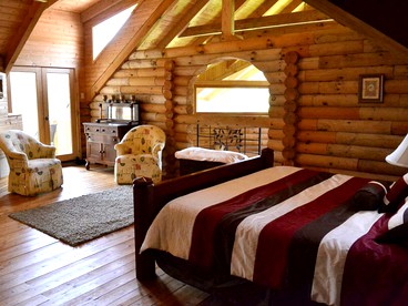 Stately Log Cabin with a Pool for a Group Getaway near Chickamauga, Georgia - Chickamauga, Georgia - glamping.directory
