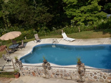 Stately Log Cabin with a Pool for a Group Getaway near Chickamauga, Georgia - Chickamauga, Georgia - glamping.directory