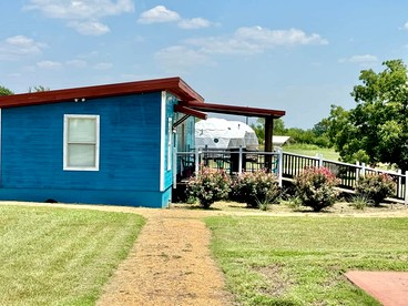Charming Cabin with Pond Retreat Near Lake Texoma, Denison TX - glamping.directory