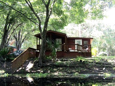 Four Person Cabin with Lofted Interior in Inverness, Florida - Inverness, Florida - glamping.directory