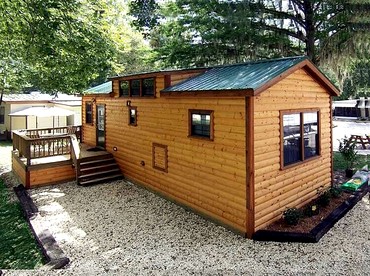 Four Person Cabin with Lofted Interior in Inverness, Florida - glamping.directory