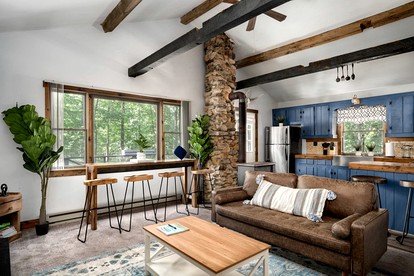 River Access Cabin with Hot Tub, Fire Pit and Kayaks for the Perfect Getaway in Rock Gap, WV - Rock Gap, West Virginia - glamping.directory