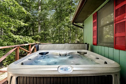 River Access Cabin with Hot Tub, Fire Pit and Kayaks for the Perfect Getaway in Rock Gap, WV - Rock Gap, West Virginia - glamping.directory