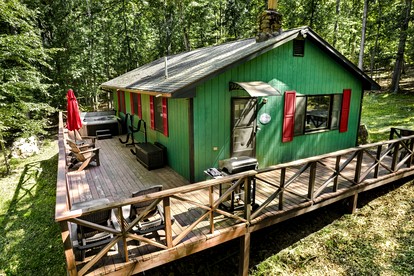 River Access Cabin with Hot Tub, Fire Pit and Kayaks for the Perfect Getaway in Rock Gap, WV - glamping.directory
