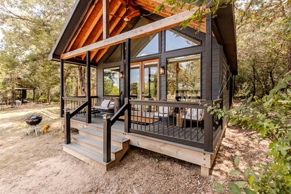 Modern Farmstay Cabin with Friendly Animals, Pond Views & Nature Trails Near Cedar Creek, Texas - glamping.directory