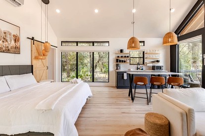 Modern Farmstay Cabin with Friendly Animals, Pond Views & Nature Trails Near Cedar Creek, Texas - Cedar Creek, Texas - glamping.directory