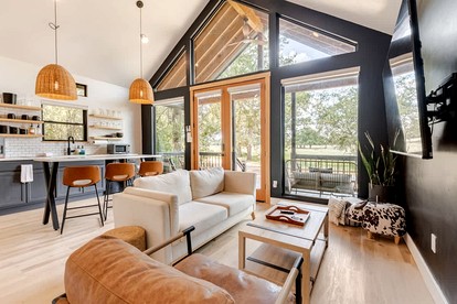 Modern Farmstay Cabin with Friendly Animals, Pond Views & Nature Trails Near Cedar Creek, Texas - Cedar Creek, Texas - glamping.directory