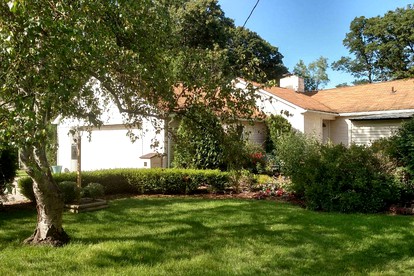 Charming Cabin with a Gorgeous Lawn and Patio in White Lake, Michigan - glamping.directory
