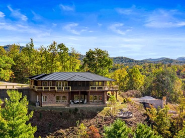 Luxury Mountain Cabin with Hot Tub and Panoramic Views near Pigeon Forge, Tennessee - glamping.directory