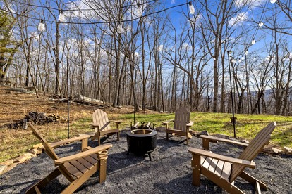 Rustic-Modern Cabin Escape with Hot Tub & Sauna in Great Cacapon, West Virginia - Great Cacapon, West Virginia - glamping.directory