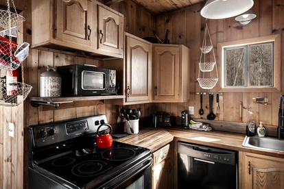 Radiant Riverfront Cabin Sanctuary near Cacapon River in West Virginia - Great Cacapon, West Virginia - glamping.directory