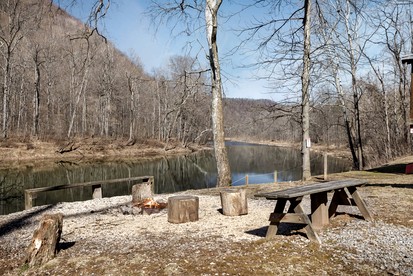 Radiant Riverfront Cabin Sanctuary near Cacapon River in West Virginia - Great Cacapon, West Virginia - glamping.directory
