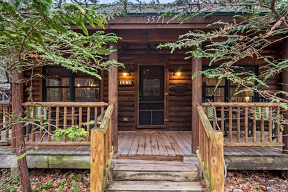 Peaceful Forest Cabin with Hot Tub, Fireplace & Outdoor Lounge in Saugatuck, Michigan - glamping.directory