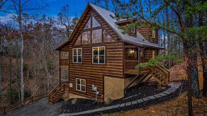 Movie Magic and Mountain Views: Family Cabin in Sevierville with Deck Hot Tub - glamping.directory