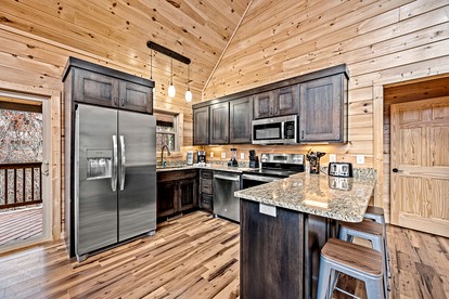 Movie Magic and Mountain Views: Family Cabin in Sevierville with Deck Hot Tub - Sevierville, Tennessee - glamping.directory